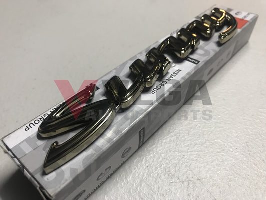 Datsun 1200 Sunny Gold Boot Emblem Badge - Vega Autosports