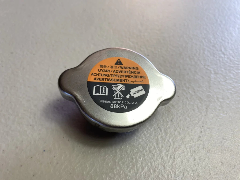 Genuine Nissan Radiator Cap to suit Radiator Cap (88kPa) to suit Nissan R31, R32, R33, R34, RNN14, S13, S14, S15, WC34, Z32 & Z33 - Vega Autosports