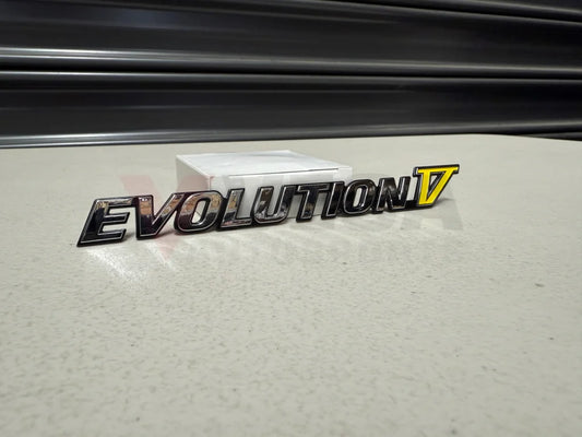 Rear ’Evolution V’ Emblem to suit Mitsubishi Lancer Evolution 5 CP9A MR388458 Emblems Badges and Decals