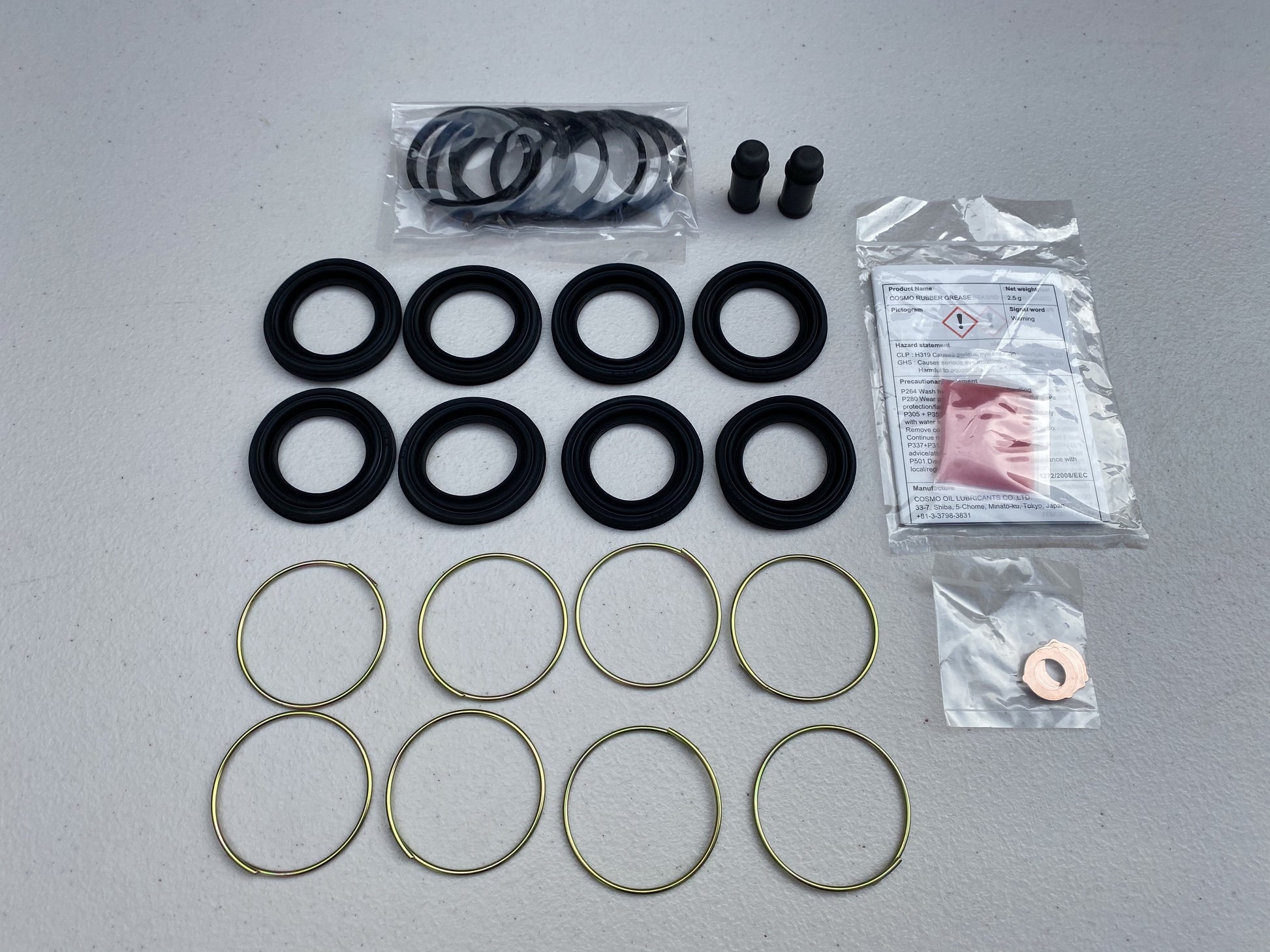 Front Brake Caliper Overhaul Kit to suit Toyota Supra JZA80 MK4 - Vega Autosports