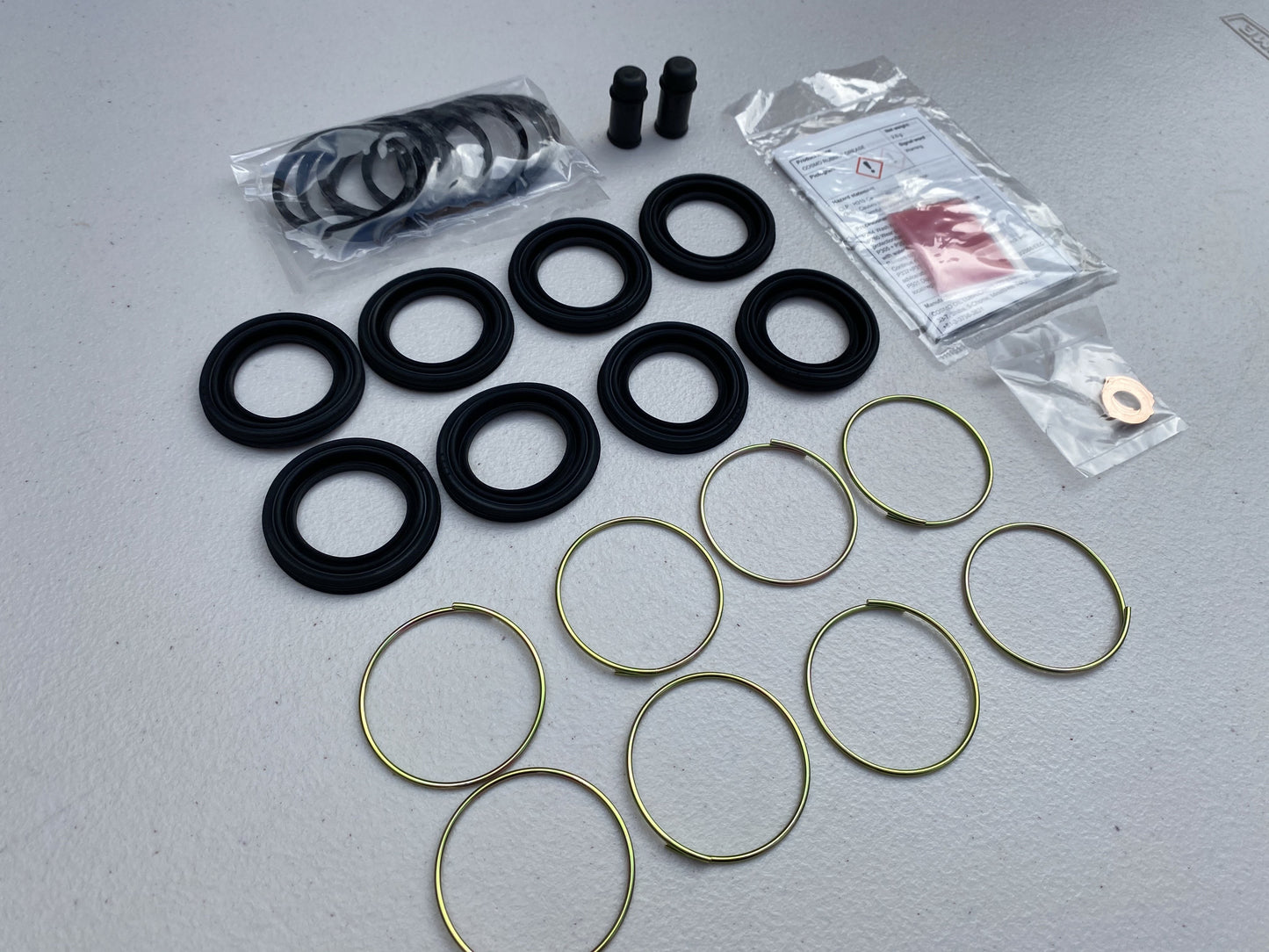 Front Brake Caliper Overhaul Kit to suit Toyota Supra JZA80 MK4 - Vega Autosports
