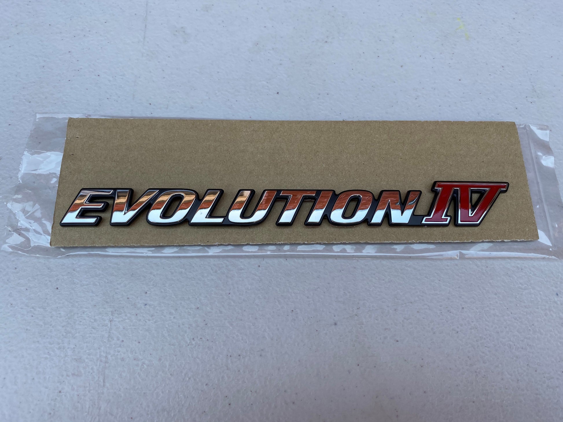 'Evolution IV' Rear Emblem to suit Mitsubishi Evo Lancer 4 - Vega Autosports