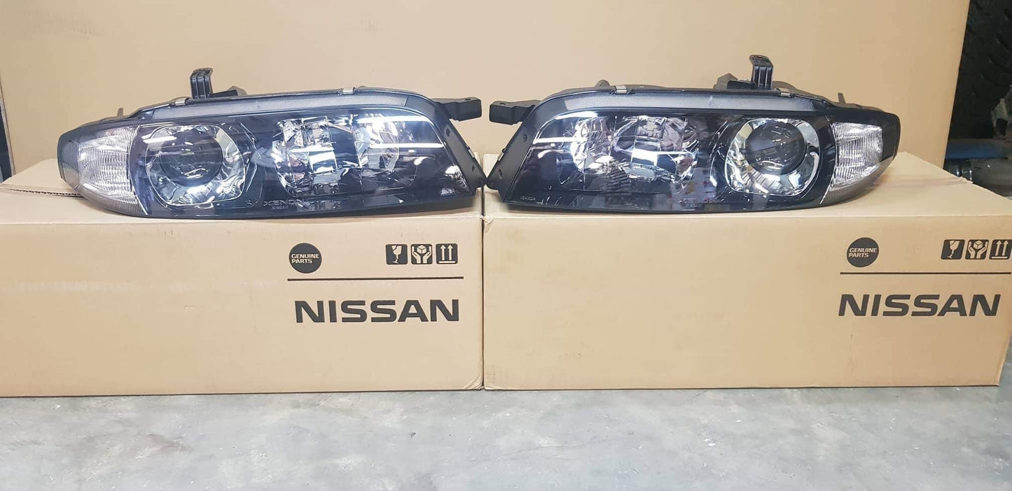 Genuine Xenon Headlight Housing Set to suit Nissan R33 GTR Series 3 - Pair **Discontinued** - Vega Autosports