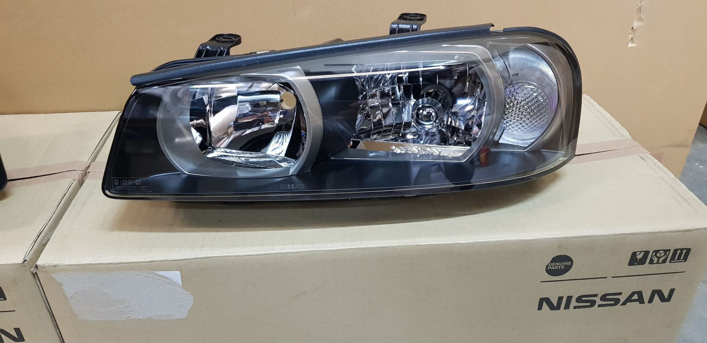 Genuine Xenon Headlight Housing Set to suit Nissan R34 GTR (Early Model) - 99/01 - 00/08 - Vega Autosports