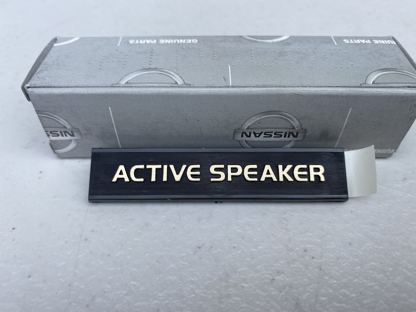 Genuine Nissan 'Active Speaker' Rear Speaker Emblem to suit Nissan Skyline R32 Models / Silvia S13 / 180SX - Vega Autosports