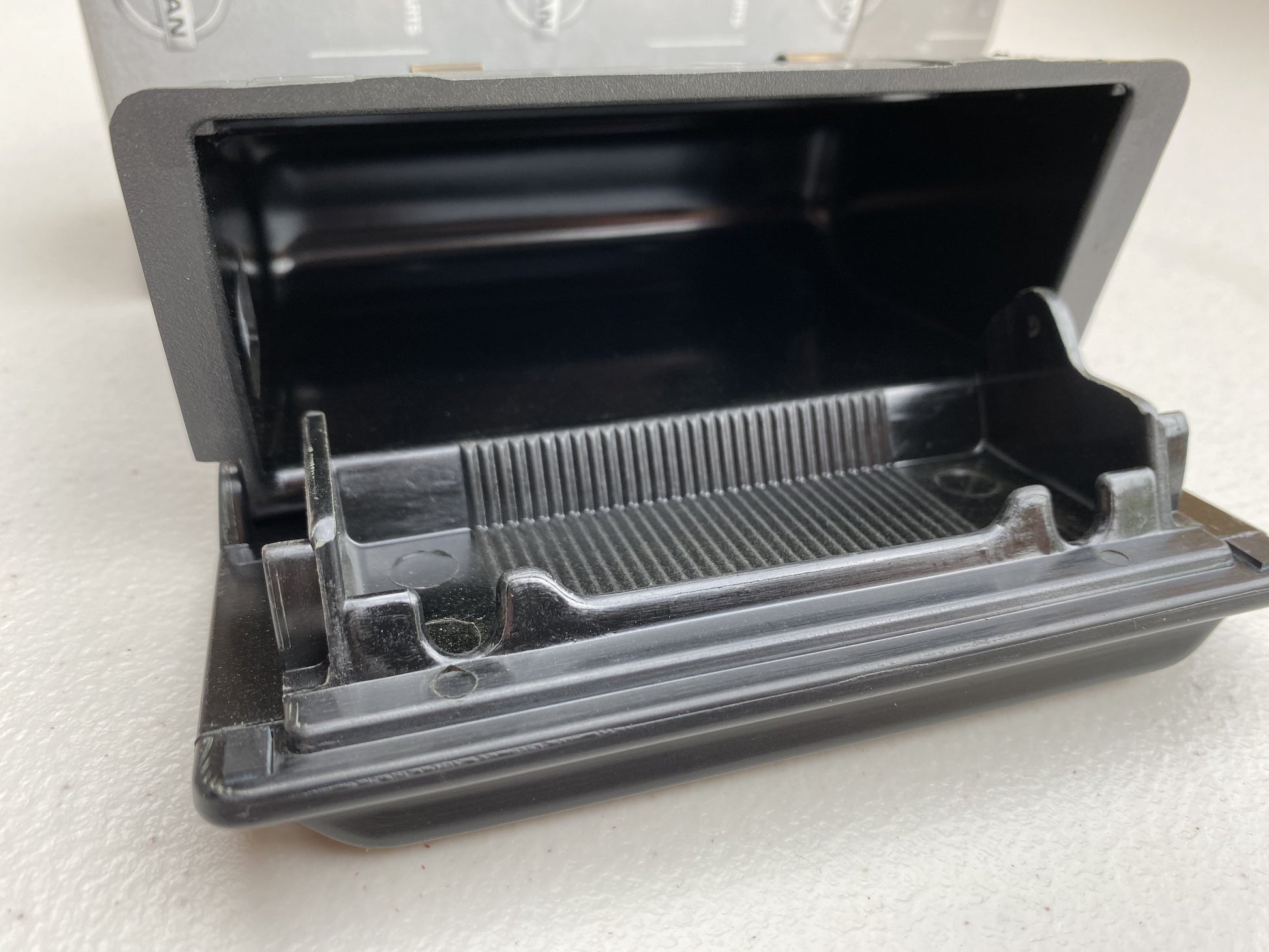 Genuine Nissan Early Model Ashtray (Front Smooth Black) to suit Nissan Skyline R32 GTR / GTS-T / GTS-4 - Vega Autosports