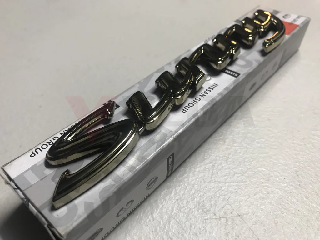 Datsun 1200 Sunny Gold Boot Emblem Badge - Vega Autosports