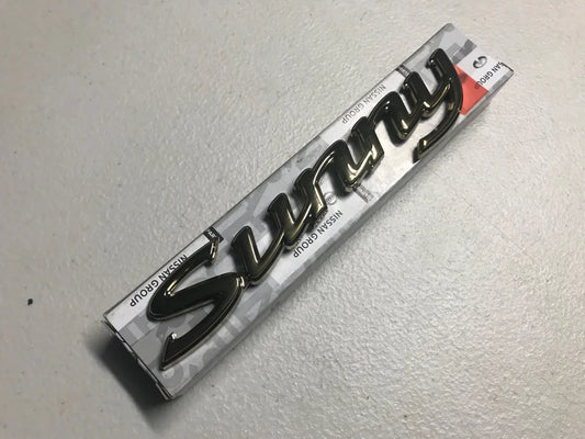 Datsun 1200 Sunny Gold Boot Emblem Badge - Vega Autosports
