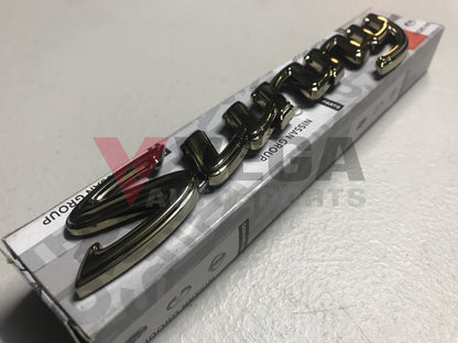 Datsun 1200 Sunny Gold Boot Emblem Badge - Vega Autosports