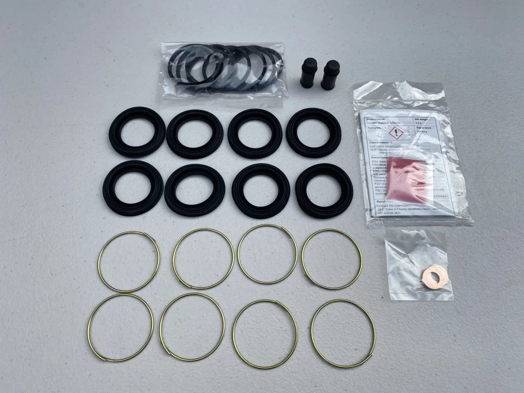 Front Brake Caliper Overhaul Kit to suit Toyota Supra JZA80 MK4 - Vega Autosports