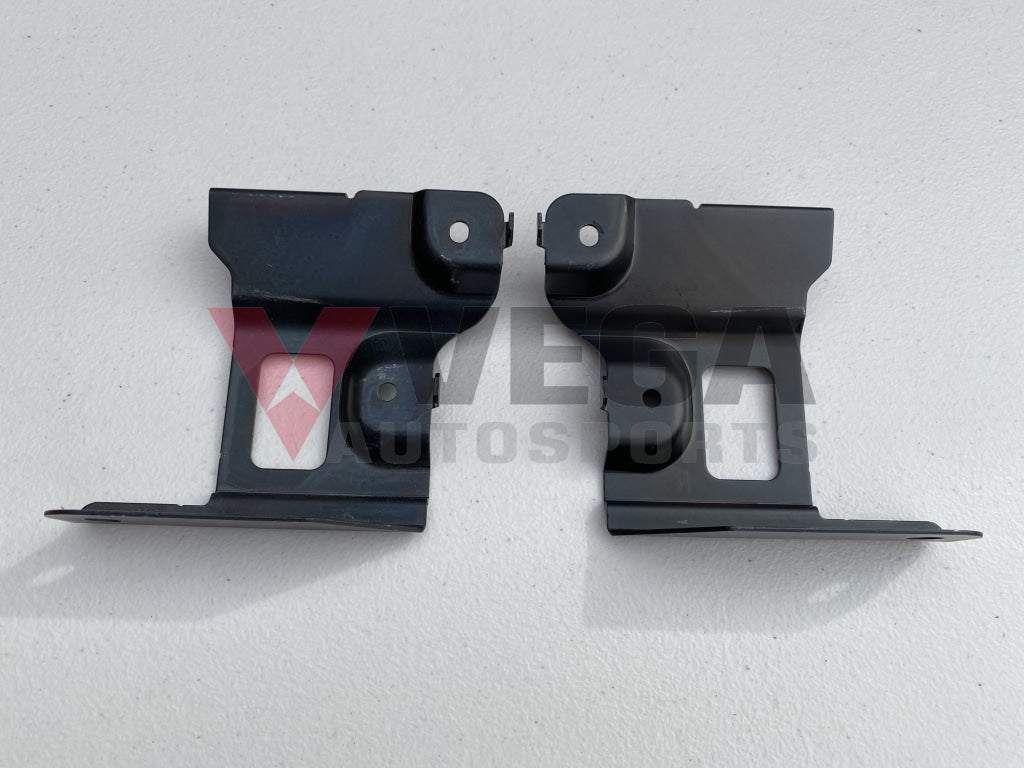 Genuine Nissan Headlight Brackets (2-Piece) to suit Nissan Skyline R34 GTR - Vega Autosports