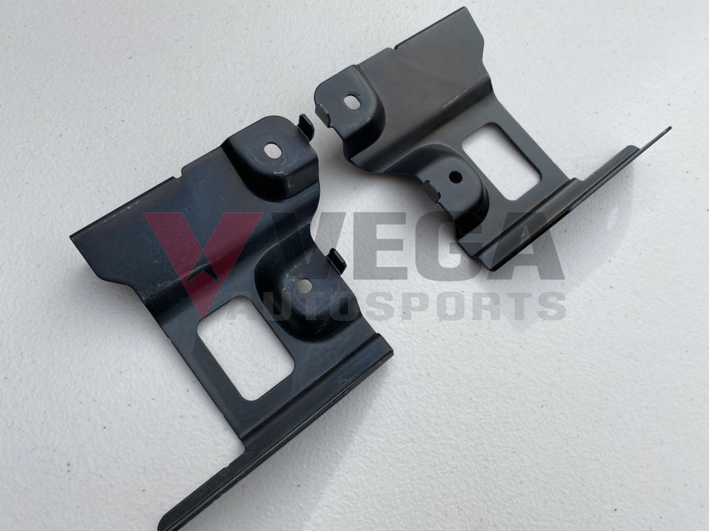 Genuine Nissan Headlight Brackets (2-Piece) to suit Nissan Skyline R34 GTR - Vega Autosports