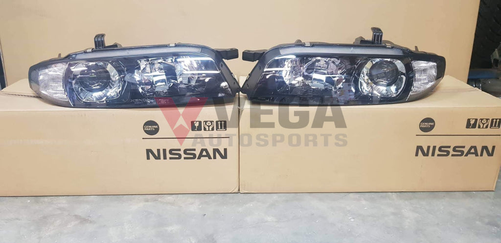 Genuine Xenon Headlight Housing Set to suit Nissan R33 GTR Series 3 - Pair **Discontinued** - Vega Autosports