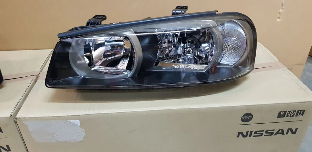 Genuine Xenon Headlight Housing Set to suit Nissan R34 GTR (Early Model) - 99/01 - 00/08 - Vega Autosports