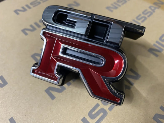 Genuine Nissan 'GTR' Front Grille Emblem to suit Nissan Skyline R34 GTR - Vega Autosports
