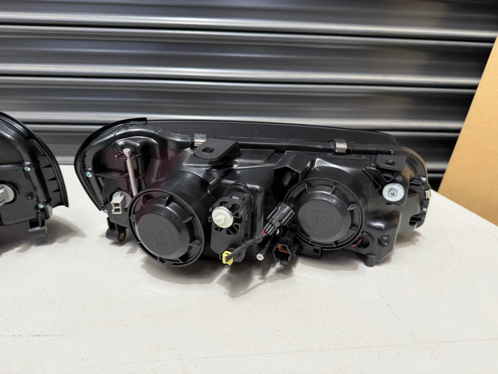 Headlight Assembly RHS & LHS (Aftermarket) to suit R34 GTR Series 1 - Electrical
