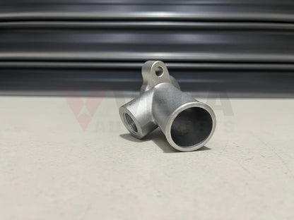 Lower Water Inlet Neck On Front Cover Datsun 76-78 280Z S30 82-83 280Zx S130 77-84 810 910