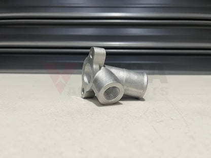 Lower Water Inlet Neck On Front Cover Datsun 76-78 280Z S30 82-83 280Zx S130 77-84 810 910