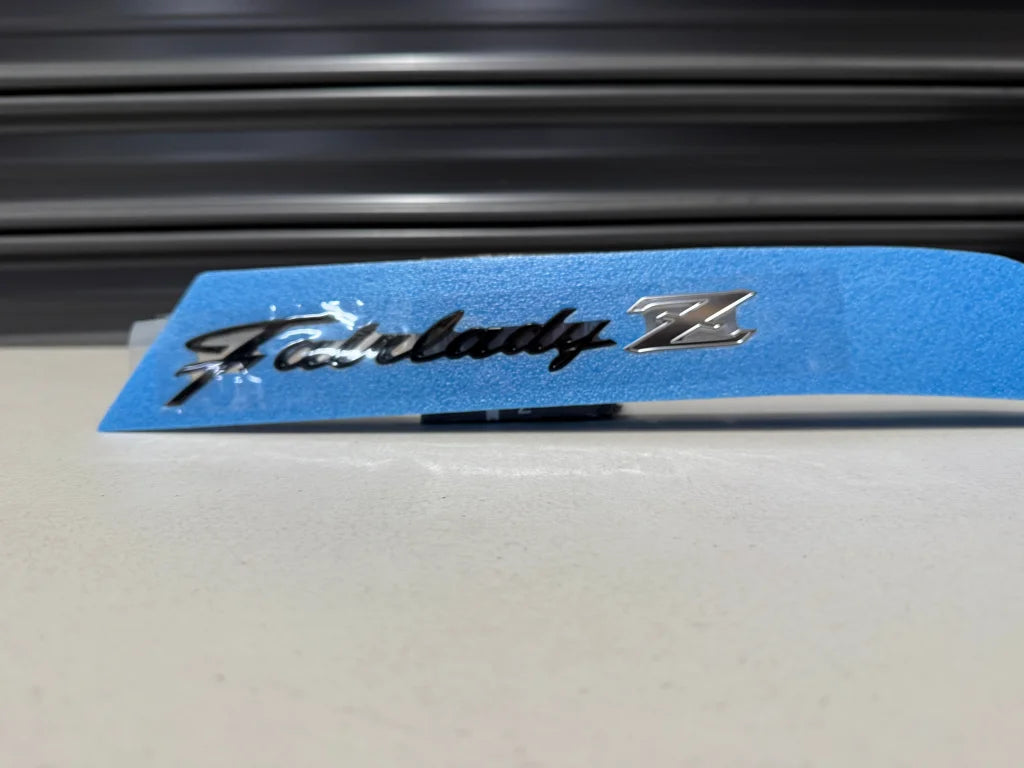 OEM ’Fairlady Z’ Rear Emblem to suit Nissan RZ34 84895-6GP1A Emblems Badges and Decals