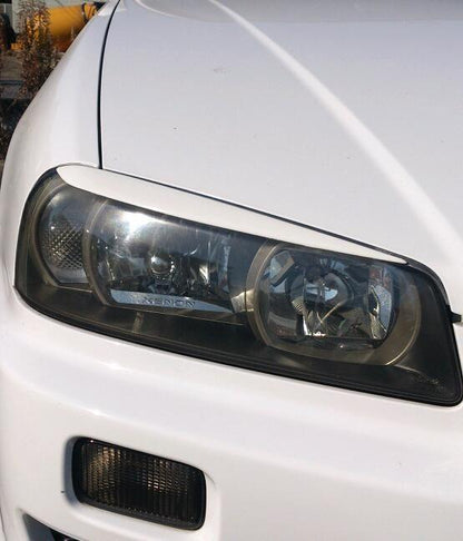 Head Light Eyeline Set Unpainted to suit Nissan Skyline R34 GTR / GTT / GT-V - Vega Autosports