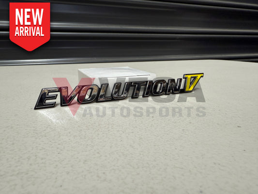 Rear ’Evolution V’ Emblem to suit Mitsubishi Lancer Evolution 5 CP9A MR388458 Emblems Badges and Decals
