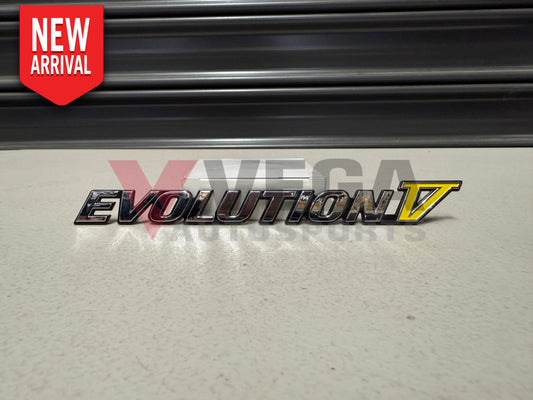 Rear ’Evolution V’ Emblem to suit Mitsubishi Lancer Evolution 5 CP9A MR388458 Emblems Badges and Decals