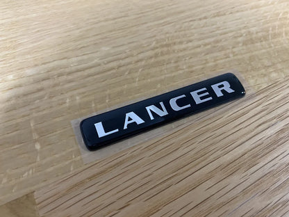Rear 'Lancer' Boot Lid Emblem to suit Lancer Evolution 7 CT9A - Vega Autosports