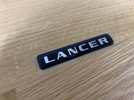 Rear 'Lancer' Boot Lid Emblem to suit Lancer Evolution 7 CT9A - Vega Autosports