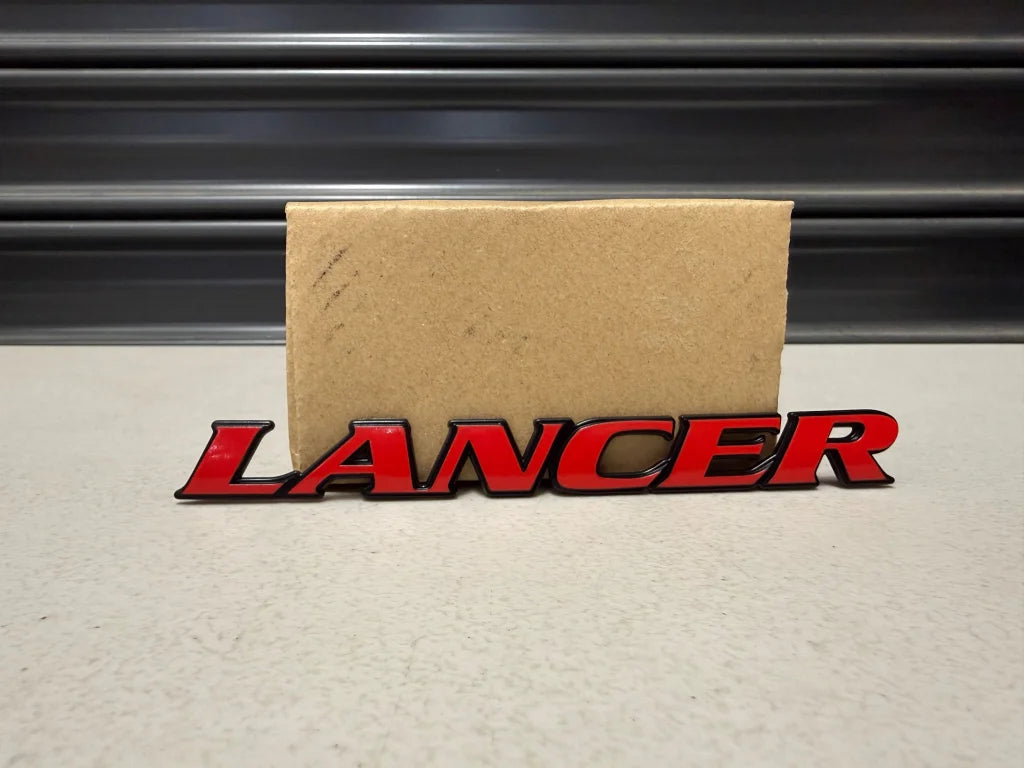 Rear ’Lancer’ Emblem to suit Mitsubishi Lancer Evolution 6 & 6.5 TME MR478299 Emblems Badges and Decals