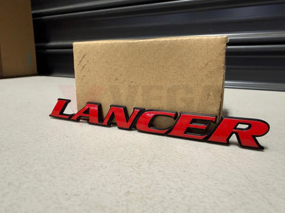 Rear ’Lancer’ Emblem to suit Mitsubishi Lancer Evolution 6 & 6.5 TME MR478299 Emblems Badges and Decals