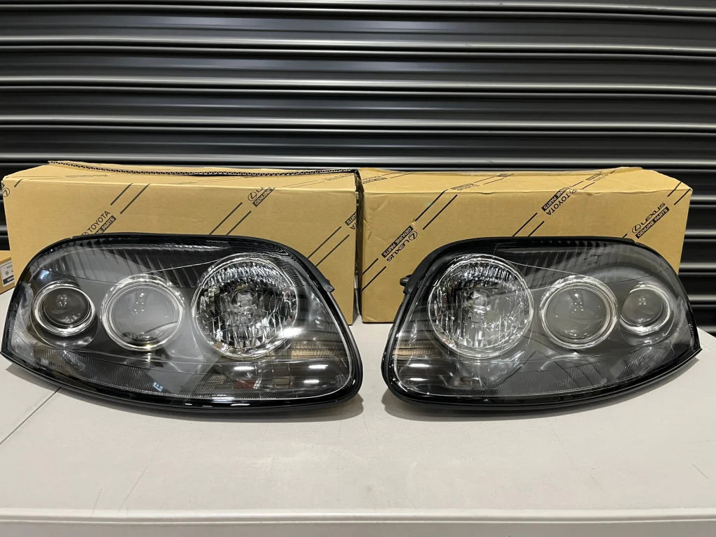 RHD Headlight Set - 81111-1B231/81151-1B231 to suit JZA80 Toyota Supra Genuine Series 2 - Vega Autosports