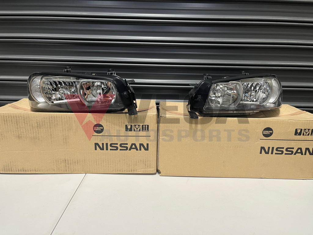 Xenon Headlight Assemblies (RHS & LHS) to suit Nissan Skyline R34 GTR (01/1999 - 08/2000) Early Model - Vega Autosports