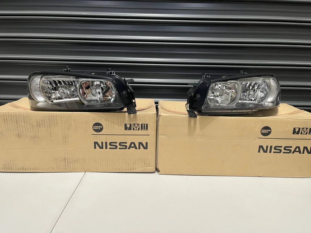 Xenon Headlight Assemblies (RHS & LHS) to suit Nissan Skyline R34 GTR (01/1999 - 08/2000) Early Model - Vega Autosports